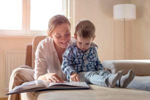 Mother and son reading a book