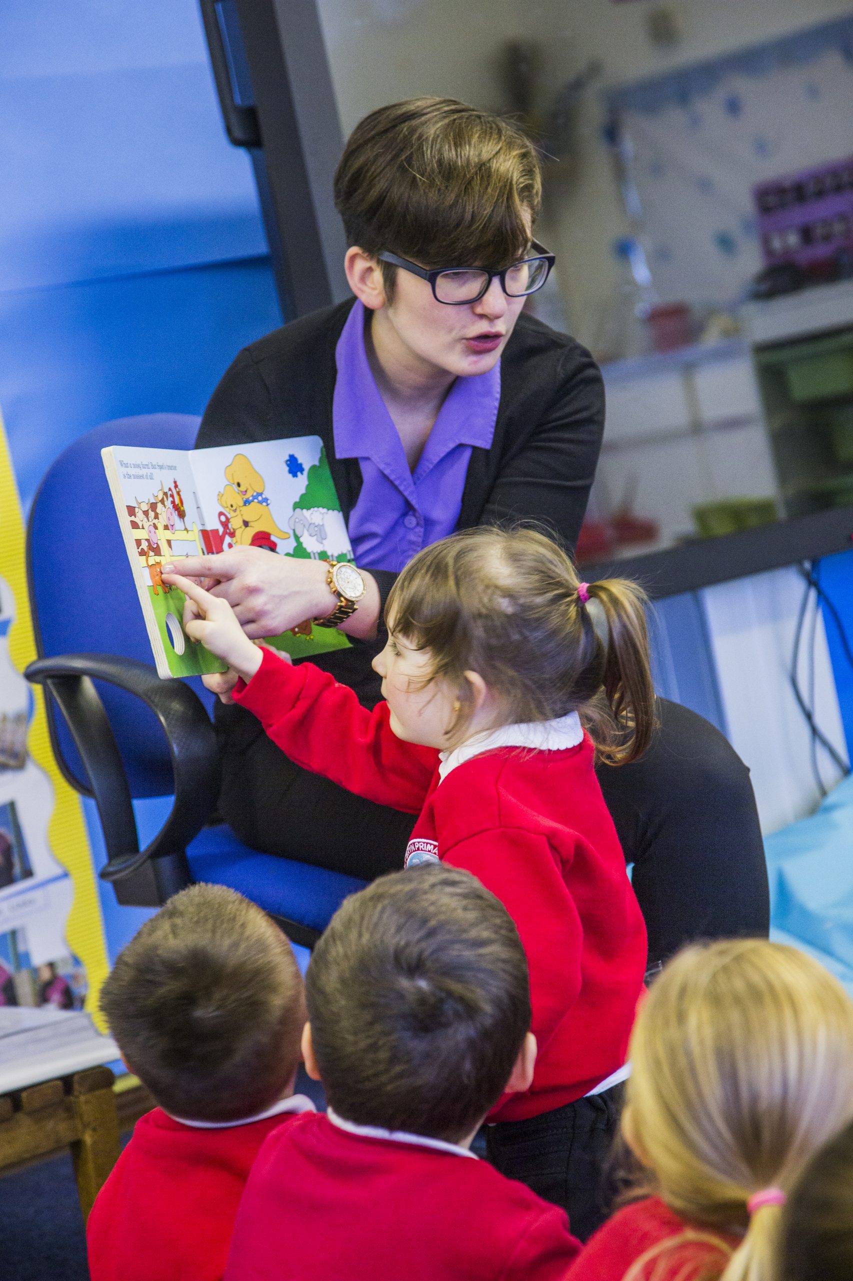 Nursery Children having story time in Llanrumney Library Nursery Visit