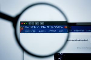 Encyclopaedia Britannica Website Header through a magnifying glass